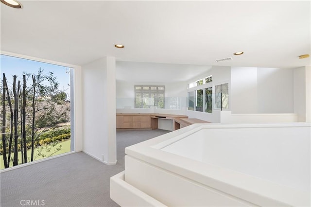 bathroom featuring visible vents and recessed lighting