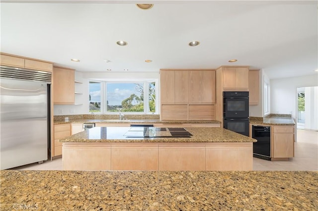 kitchen with black appliances, light brown cabinetry, open shelves, and a center island