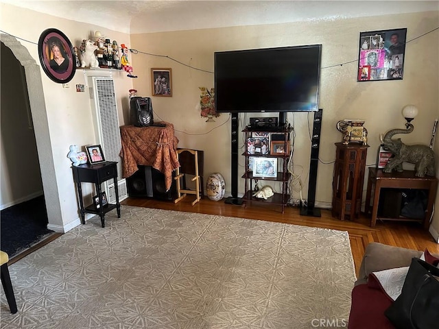 living room with wood-type flooring