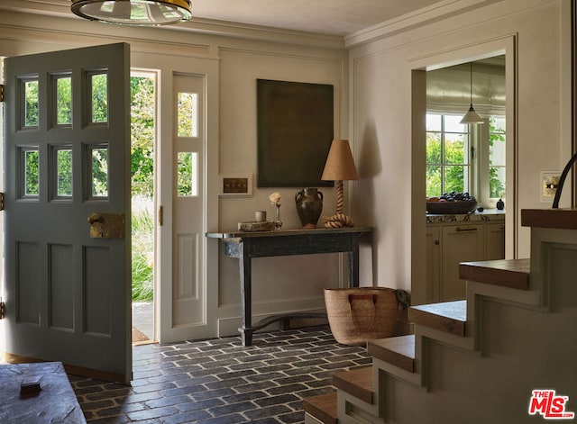 foyer with ornamental molding