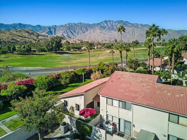 birds eye view of property with a mountain view