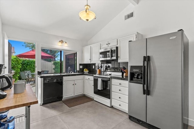 kitchen featuring backsplash, beamed ceiling, sink, white cabinetry, and stainless steel appliances