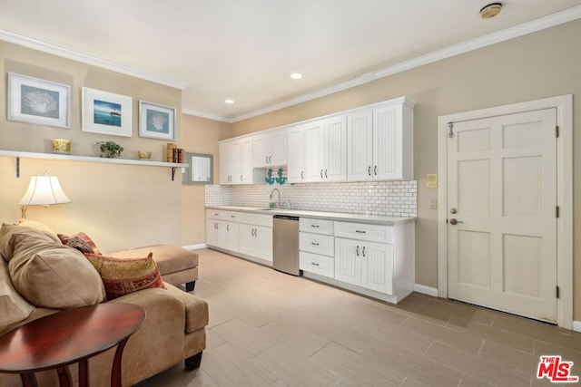 sitting room with ornamental molding and sink