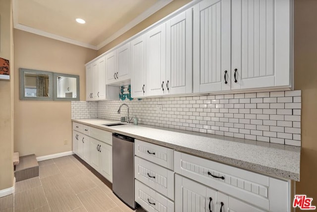 kitchen with tasteful backsplash, stainless steel dishwasher, sink, light stone countertops, and white cabinets