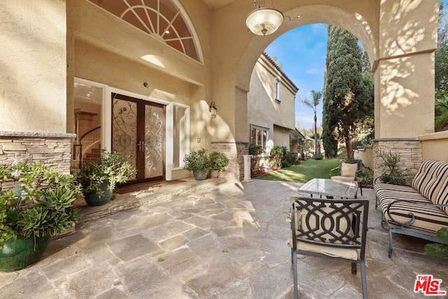 view of patio / terrace featuring outdoor lounge area and french doors