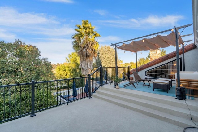 view of patio / terrace featuring a balcony