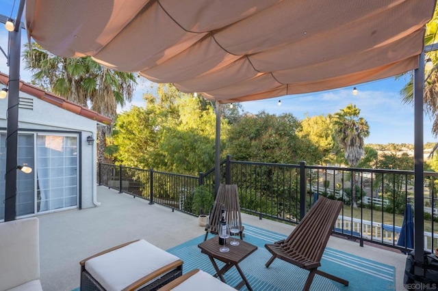 view of patio / terrace featuring a balcony