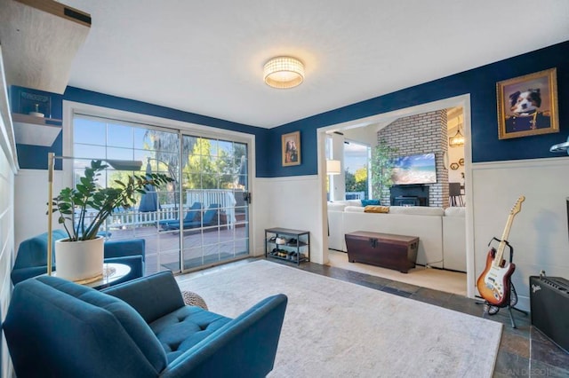 living room featuring a fireplace