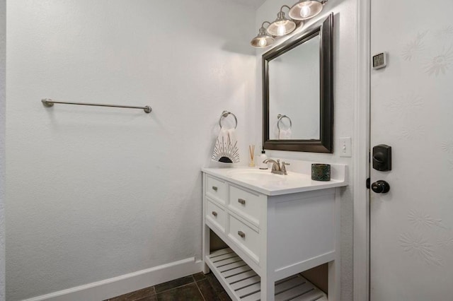 bathroom featuring tile patterned flooring and vanity