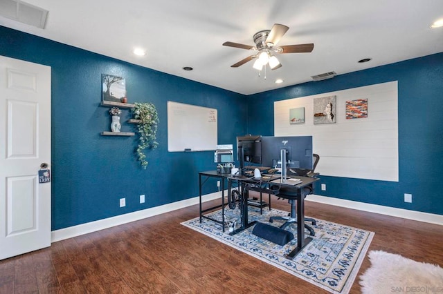 office with ceiling fan and dark wood-type flooring