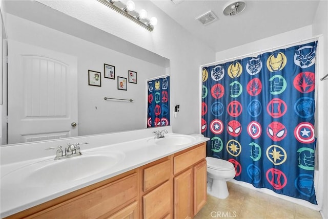 bathroom with toilet, tile patterned flooring, a shower with shower curtain, and vanity