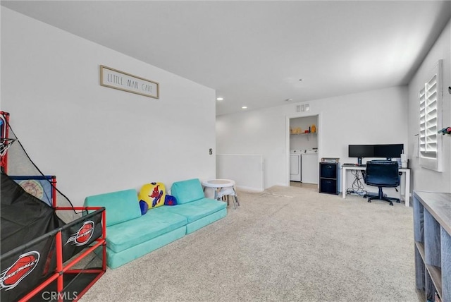 interior space with washing machine and dryer