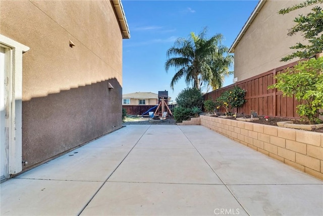 view of patio / terrace featuring a playground