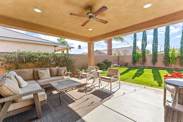 view of patio featuring outdoor lounge area and ceiling fan