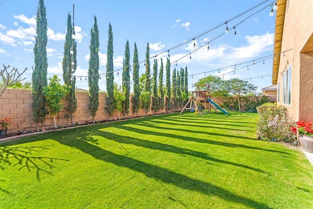 view of yard with a playground