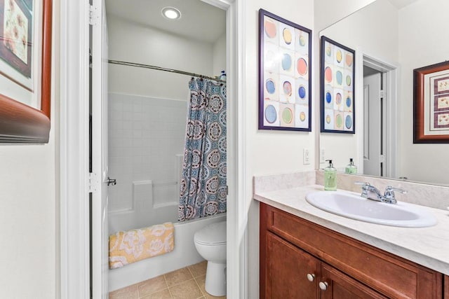 full bathroom with tile patterned floors, toilet, vanity, and shower / bath combo