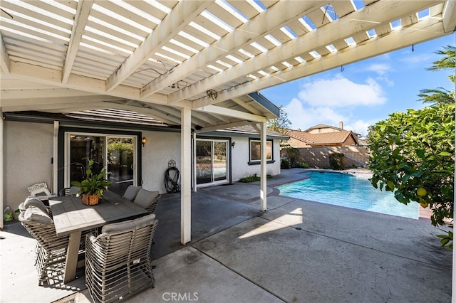 view of swimming pool featuring a pergola and a patio