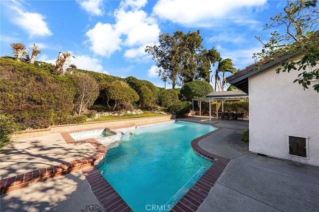 view of pool featuring a gazebo, a patio, and an in ground hot tub