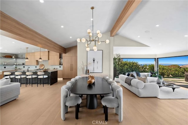 dining area with beam ceiling, high vaulted ceiling, a chandelier, light wood-style floors, and recessed lighting