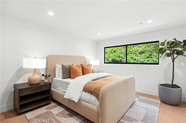 bedroom featuring light hardwood / wood-style flooring