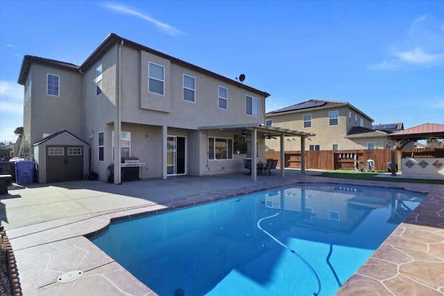 view of pool featuring a gazebo, area for grilling, a patio, and a pergola