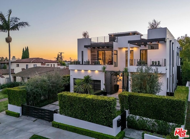 modern home featuring a balcony