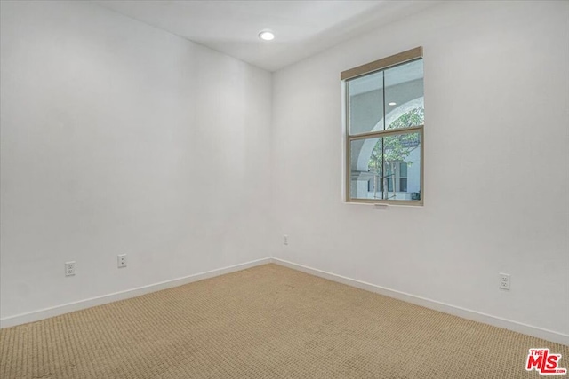 view of carpeted spare room