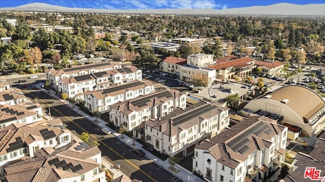 birds eye view of property featuring a mountain view