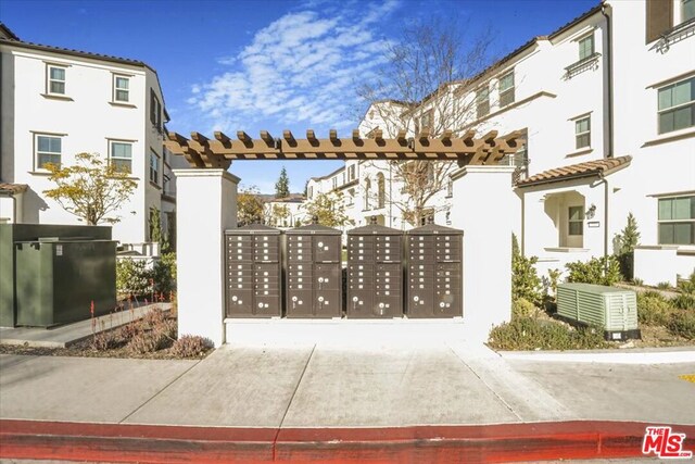 surrounding community featuring mail boxes