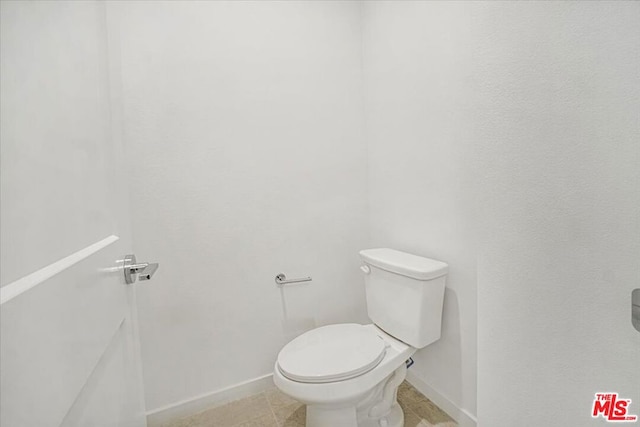 bathroom featuring toilet