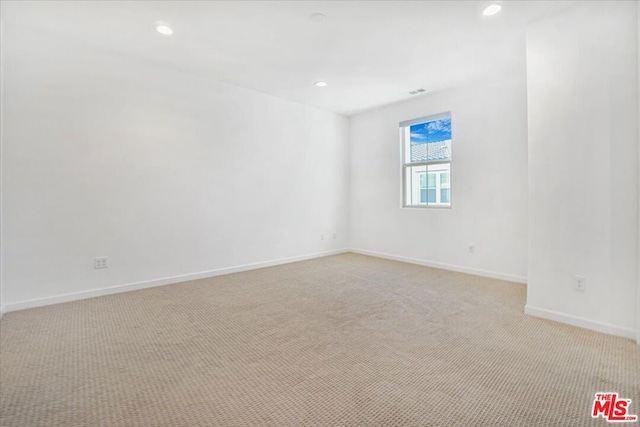 empty room with light carpet