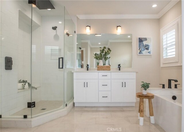 bathroom with vanity, ornamental molding, and shower with separate bathtub