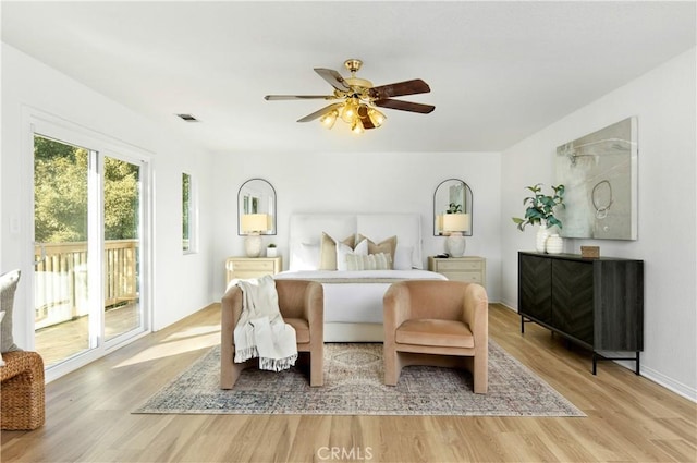 bedroom with access to outside, ceiling fan, and light hardwood / wood-style floors