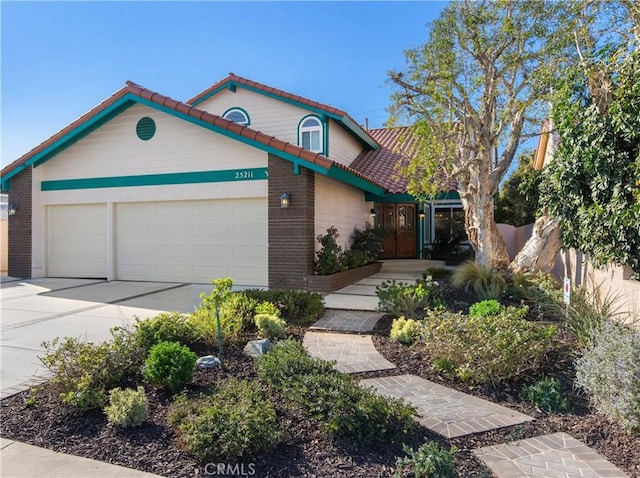 front of property with a garage