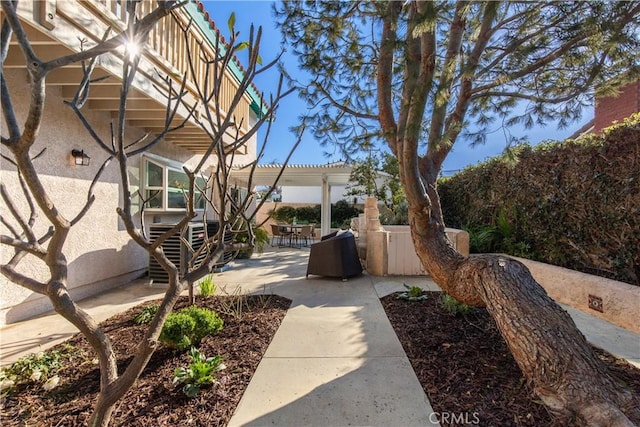 view of yard with a pergola and a patio