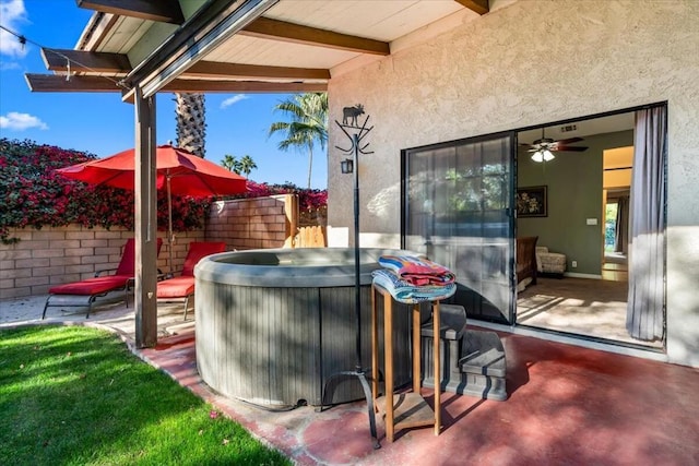 view of patio / terrace featuring a hot tub