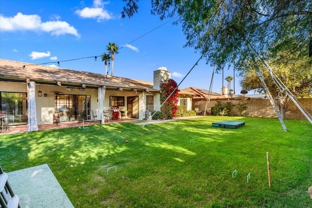 view of yard with a patio area