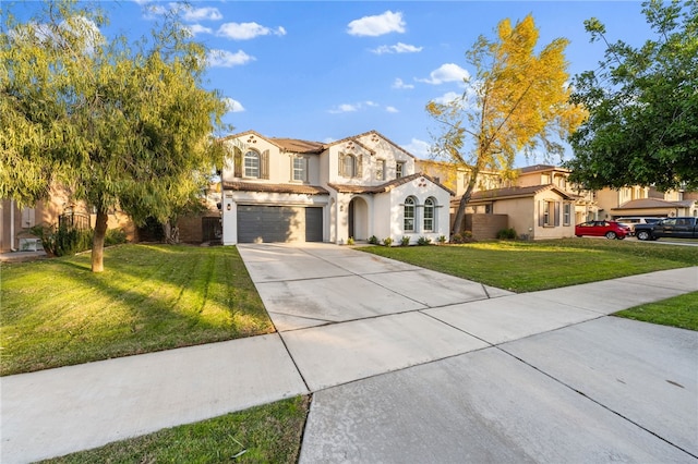 mediterranean / spanish house featuring a front lawn and a garage