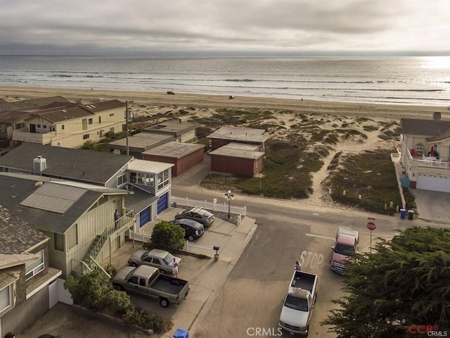 aerial view featuring a beach view and a water view