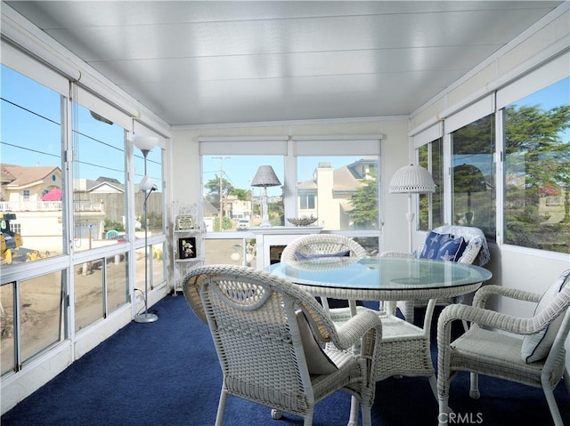 sunroom / solarium with plenty of natural light