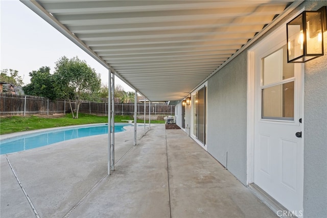 view of pool featuring a patio area