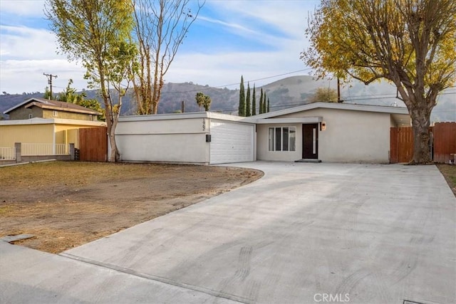 ranch-style house featuring a mountain view