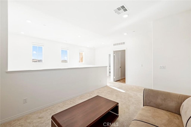 living room with light carpet