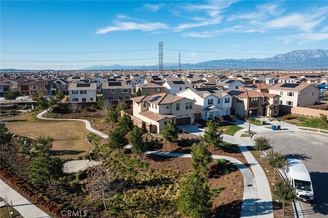 birds eye view of property featuring a mountain view