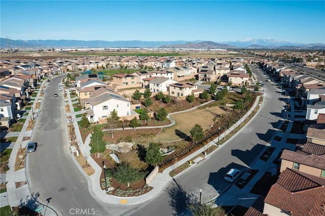 drone / aerial view featuring a mountain view