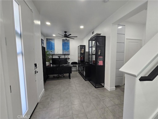 corridor with light tile patterned flooring