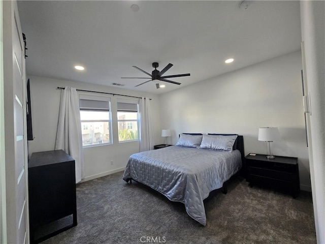 carpeted bedroom with ceiling fan