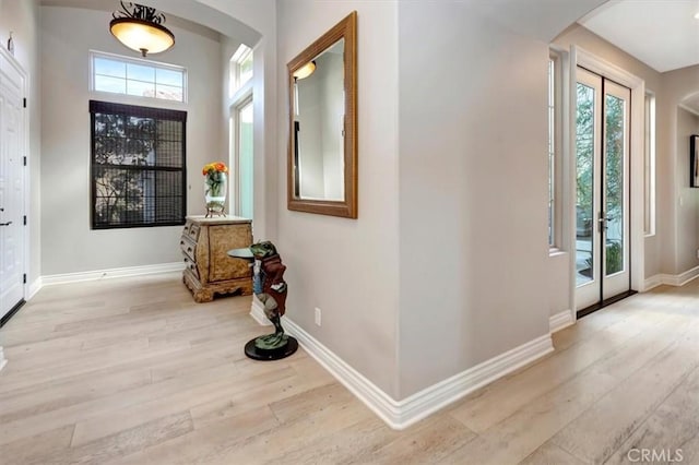 foyer entrance featuring light wood-type flooring