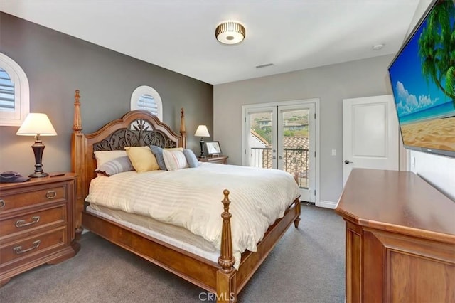 carpeted bedroom with access to outside, visible vents, baseboards, and french doors