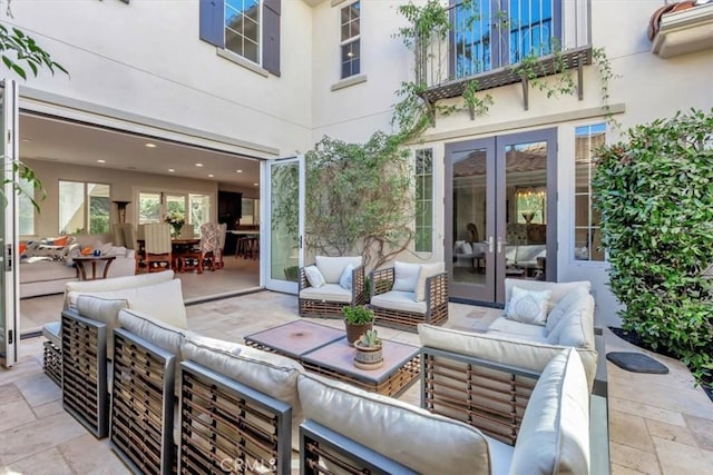 view of patio with french doors and outdoor lounge area